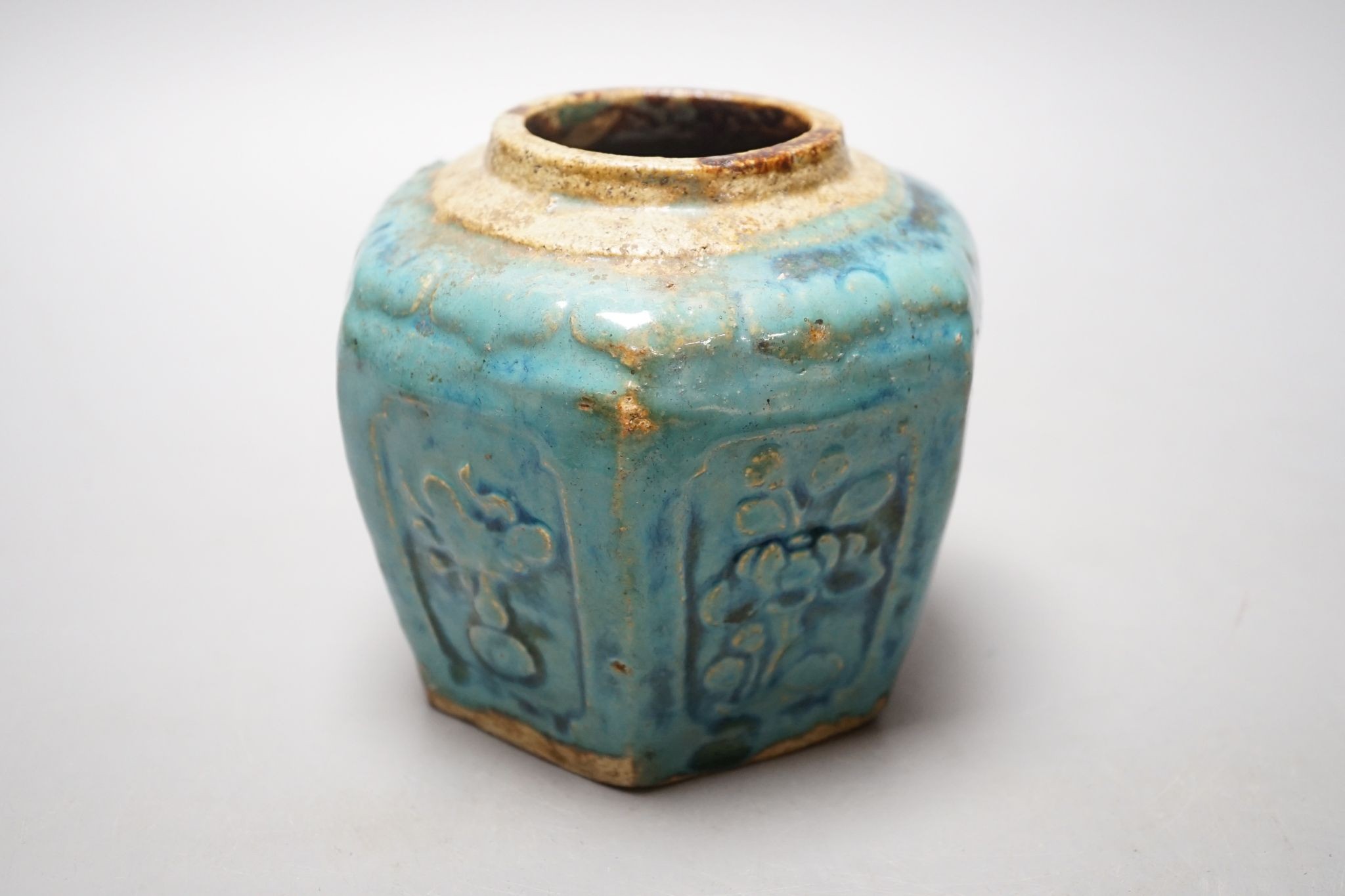 Two Chinese bronze handwarmers and a turquoise glazed jar